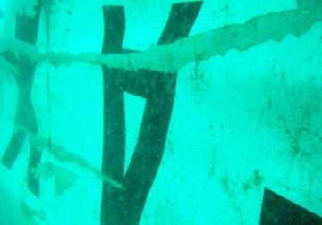 airasia plane s tail lifted from seabed no black box found