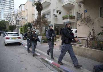 gunman kills 2 at bar in tel aviv manhunt underway