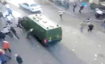 video shows police van running over protesters in cairo .