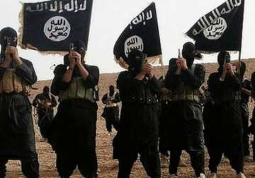 isis hangs two boys for eating in ramadan