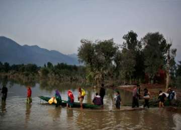 boat capsizes in flood hit pakistan s punjab province 18 people killed