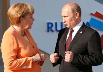 vladimir putin angela merkel call for dialogue to solve ukraine crisis