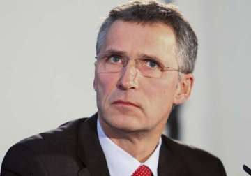 nato steps up to russia but back from afghanistan