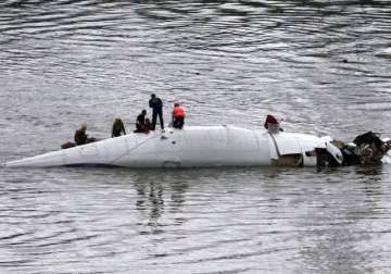crashed taiwan plane hoisted from river 26 confirmed dead