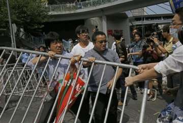 police removing barriers in hong kong protest zone