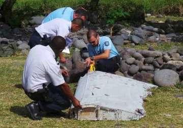 likely piece of doomed flight mh370 found in mozambique