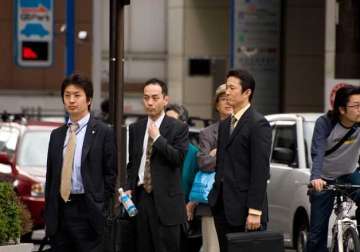 japanese workers must take five days of annual vacation