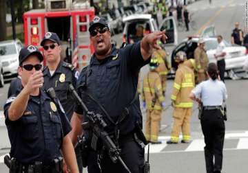 one dead four wounded in us shootings