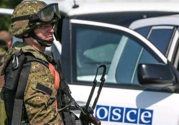 ukraine truce largely holding osce