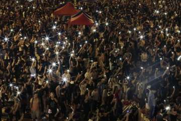 hong kong protesters stage massive defiant rally
