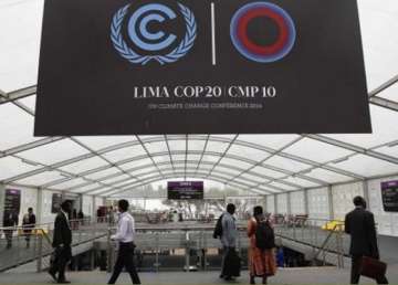 climate deal struck after marathon talks india s concerns met