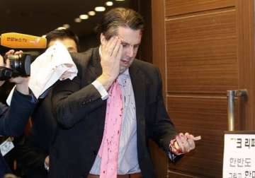 knifed us envoy to seoul in pain as officials investigate