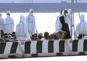 survivor smugglers locked hundreds in hold of capsized boat