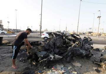 iraq at least 14 killed in suicide car bomb attack