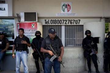 mexico federal police take over city after attacks