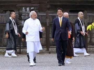 lotus at toji temple amuses narendra modi details abe about its significance