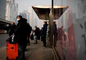 beijing issues first red alert for smog schools asked to remain shut