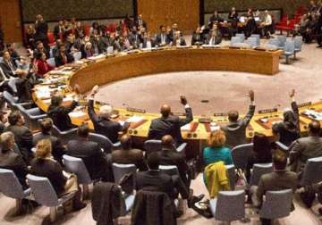 un security council approves resolution urging action against islamic state
