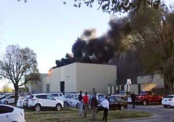 four die as plane crashes into building in us