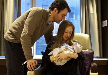 new mom chelsea clinton celebrates baby daughter