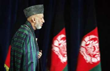 impostor posing as taliban mullah meets karzai