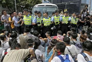 hk democracy activists defy police in standoff