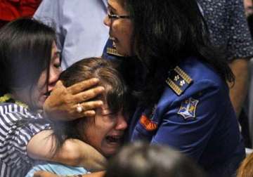 bad weather hobbles indonesia jet recovery 7 bodies found