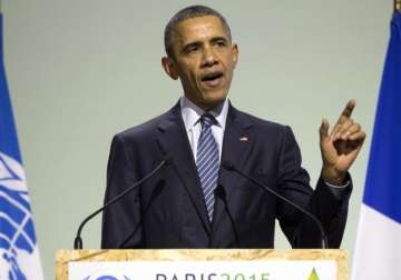 obama hits out at republicans for opposing climate change agreement