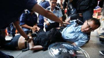 hong kong police arrest 26 amid street clashes