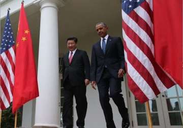 xi obama vow to work together to implement paris climate deal