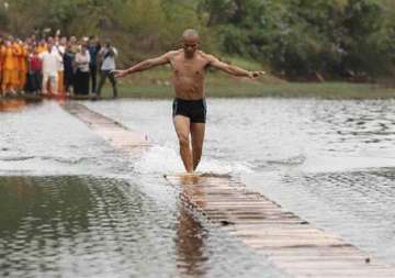 shaolin monk walks on water for 125 meters breaks own record