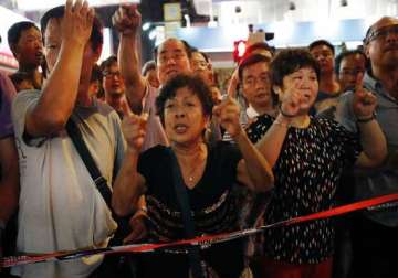 hong kong activists plan trip to beijing on saturday