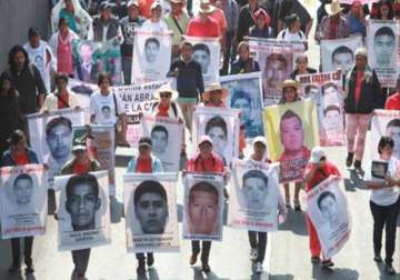 thousands demonstrate in mexico in remembrance of missing students