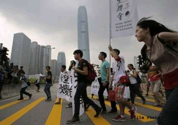 march planned to mark a month of protests in hong kong