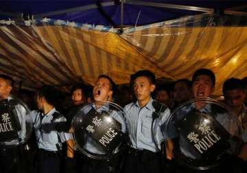 hong kong police move in against protest zone