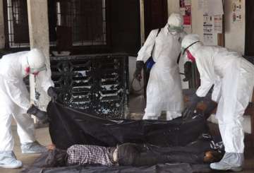 red cross team attacked while burying ebola dead