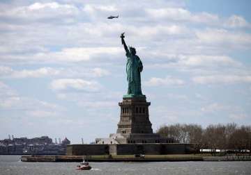 statue of liberty evacuated after bomb threat