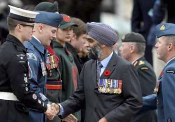 canada s indian origin defence minister racially abused by officer