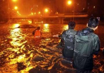 seven killed in china downpour