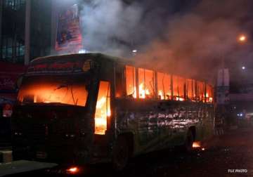 four burnt in dhaka bus attack