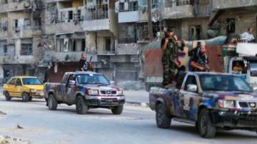 syrian troops recapture town near damascus