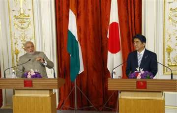 japan wooing india to contain china says chinese daily