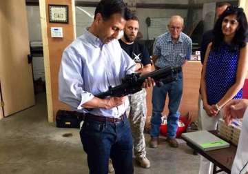 bobby jindal mocked for posing with gun at campaign stop
