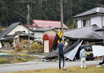 japan earthquake collapses homes causes injuries