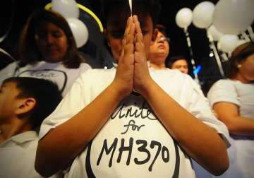 relatives torn over possible 1st debris from missing mh370