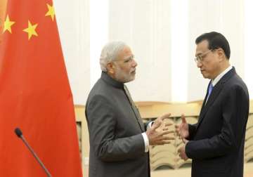india china vow to settle border issue at earliest