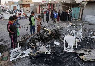 iraq 15 killed in bombings in and around baghdad