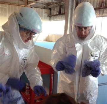 ebola training focuses on astronaut like gear