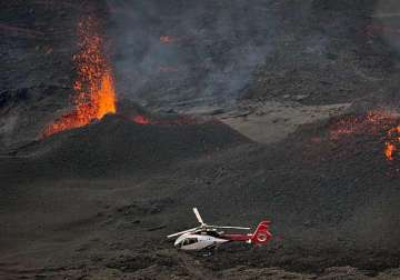 highly active volcano erupts on reunion amid media frenzy
