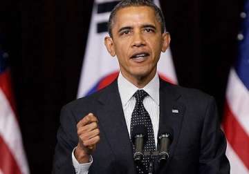 obama condemns ferguson gunmen who shot cops says there is no excuse for criminal acts